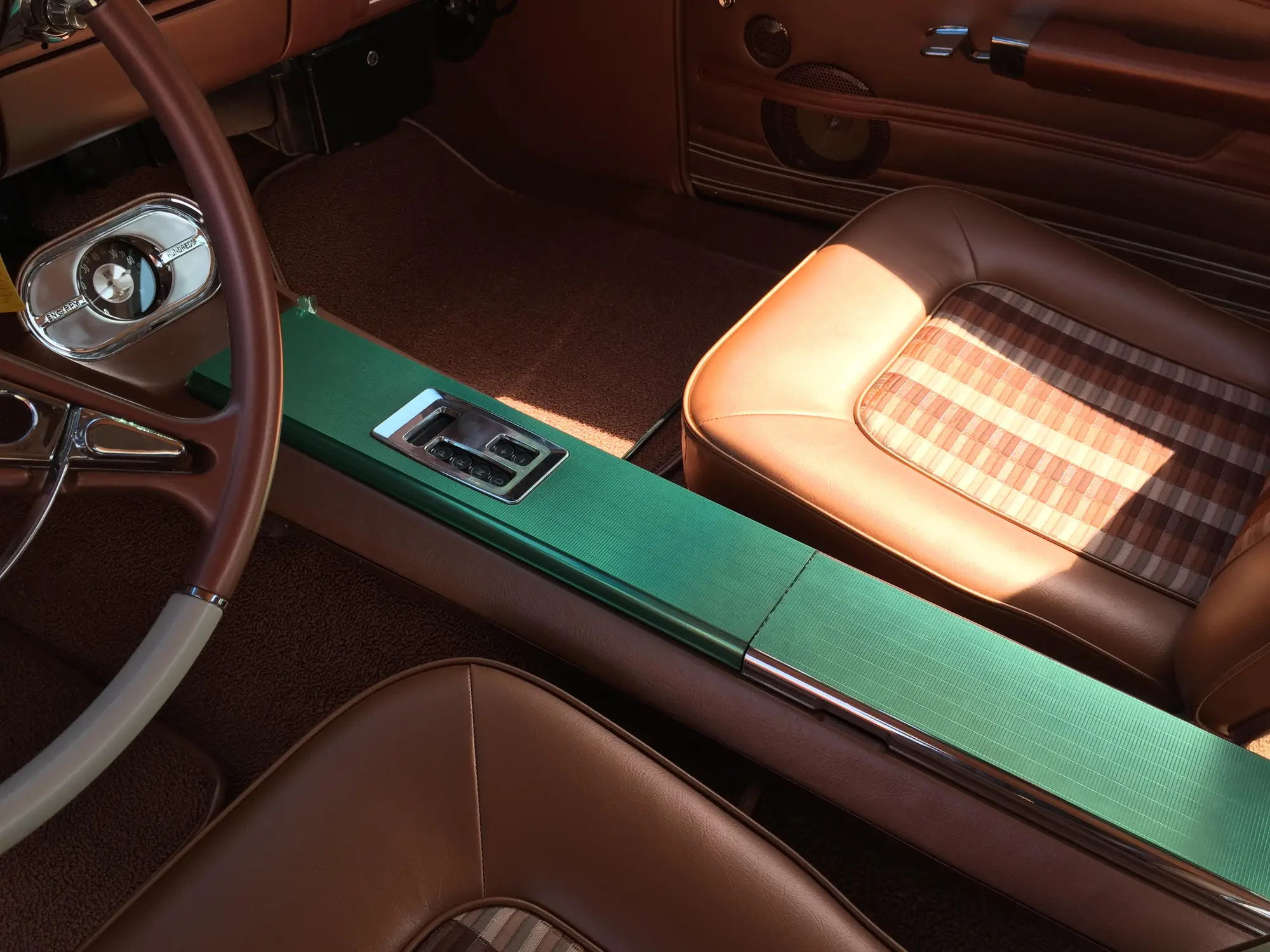 Custom brown classic-car interior with a green center console
